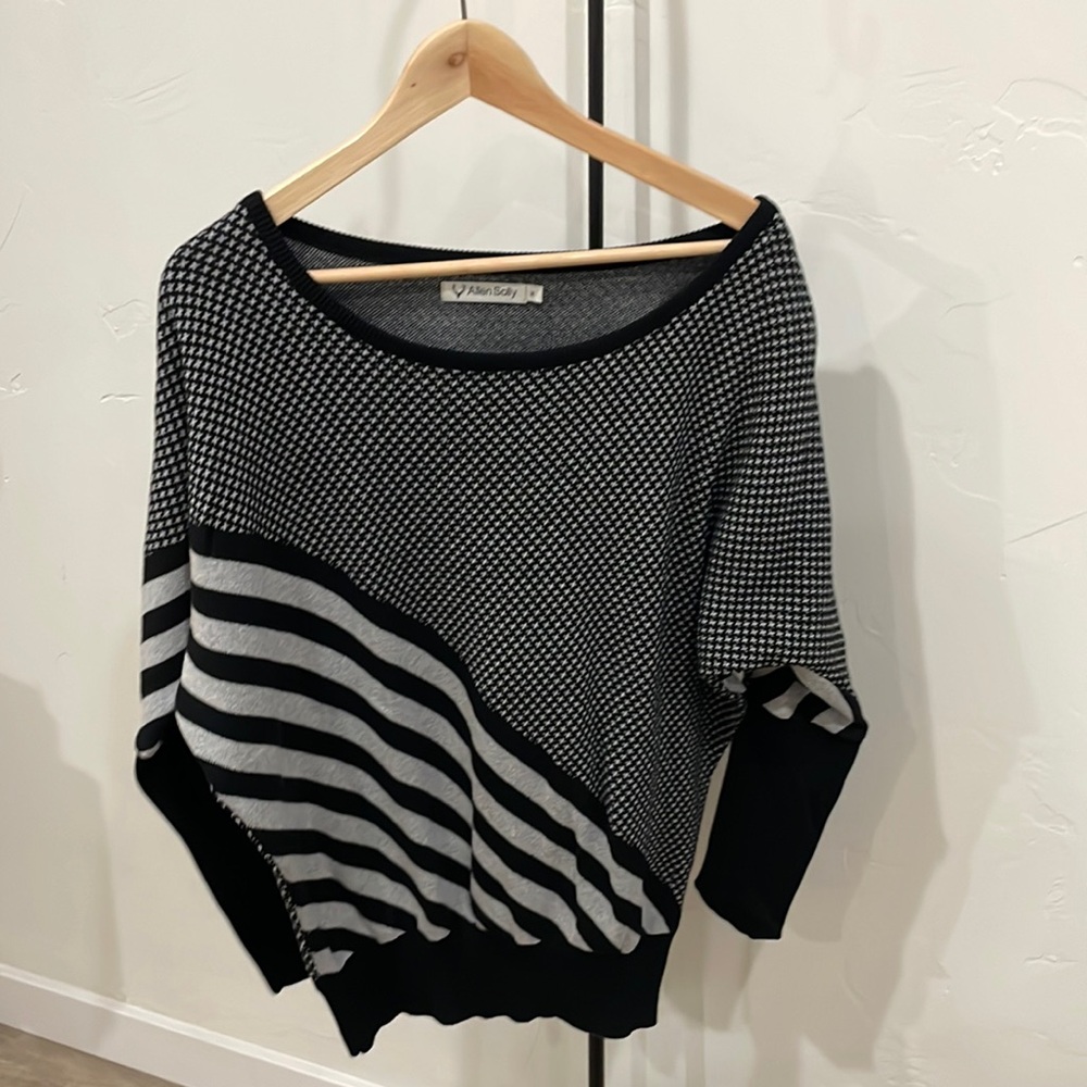 - Black and white sweater